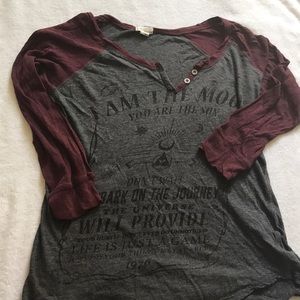 A very soft burgundy and gray midsleeve T-shirt